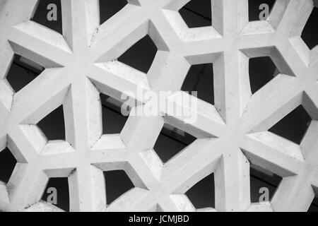 Abstract geometric pattern, white stone lattice with Arabic ornament, background texture Stock Photo