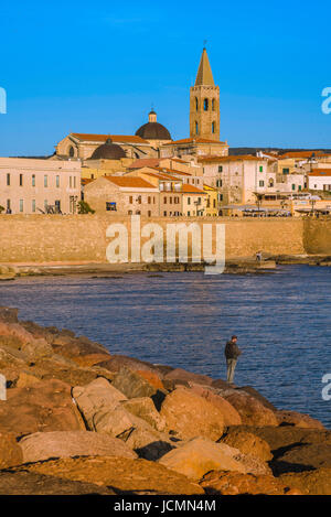 Alghero Sardinia, view of the skyline and the historic sea wall - or bastioni- along the western side of Alghero in northern Sardinia. Stock Photo