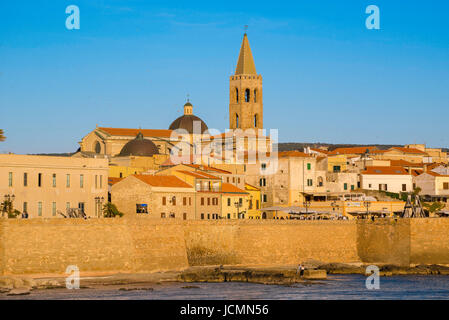 Alghero Sardinia, view of the skyline and the historic sea wall - or bastioni- along the western side of Alghero in northern Sardinia. Stock Photo