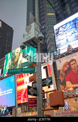 nypd police security surveillance cameras evening in Times Square New York City USA Stock Photo