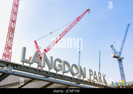 London, UK - March 27th, 2017 - Langdon Park sign with building cranes in the background