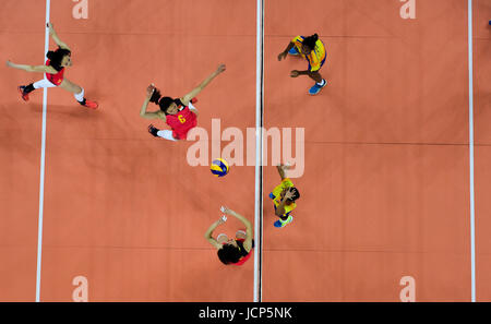 Guangzhou, China's Guangdong Province. 17th June, 2017. China's Zhang Yuqian (2nd L) spikes the ball during the women's volleyball match against India at 2017 BRICS Games in Guangzhou, south China's Guangdong Province, June 17, 2017. Credit: Mao Siqian/Xinhua/Alamy Live News Stock Photo