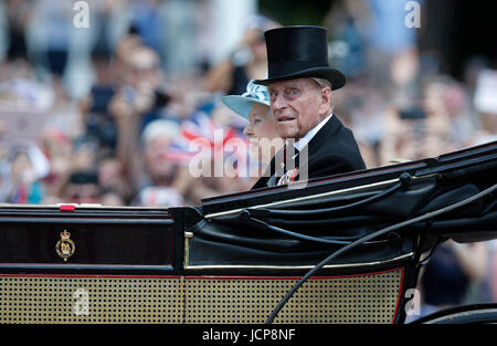 London, UK. 17th June, 2017. Britain's Queen Elizabeth II and Prince Philip travel in a horse-drawn carriage back to Buckingham Palace after attending Trooping the Colour in London, Britain on June 17, 2017. Credit: Han Yan/Xinhua/Alamy Live News Stock Photo