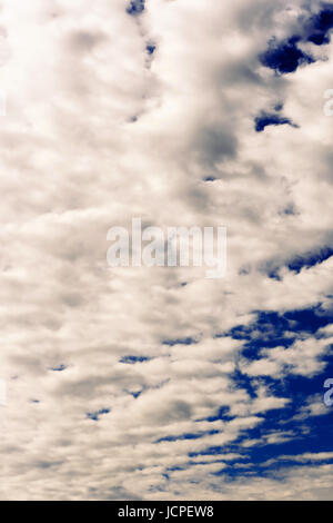 Cloudy blue gray spring sky natural background Stock Photo