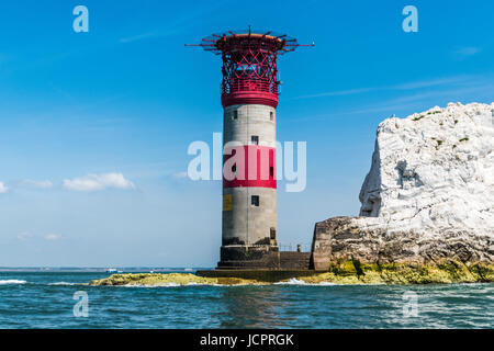 Needles lighthouse and single rock  from the sea  alum bay isle of wight england Stock Photo