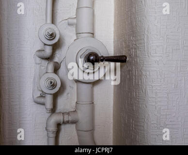Rising water main for sprinkle system with shut off valve Stock Photo