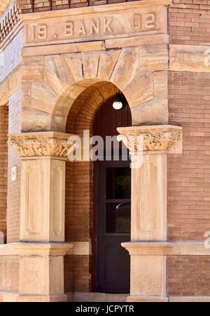 Entrance to old bank building Stock Photo