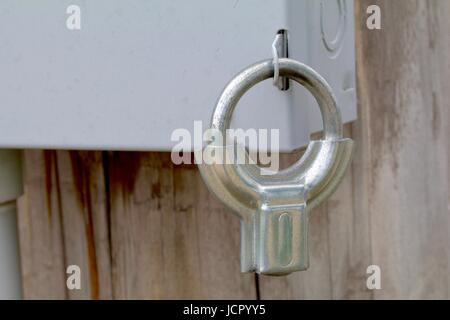Electric box clamp style lock Stock Photo