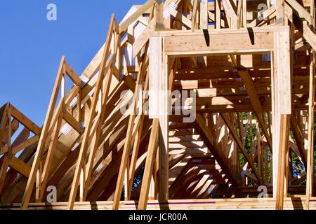 Pine skeletion of a house under construction Stock Photo