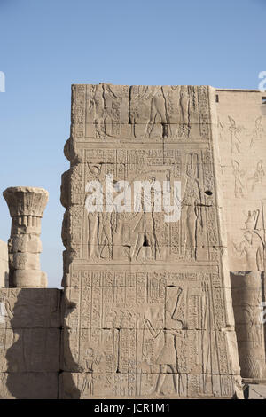 Partial view of Edfu Temple, It is one of the best preserved shrines in Egypt, Dedicated to the falcon god Horus, Was built in the Ptolemaic period be Stock Photo