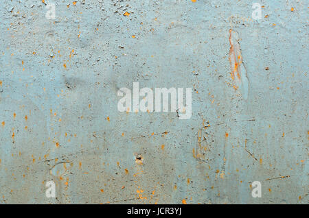 Cracked paint on old metal texture. Blue color. Rusted surface Stock Photo