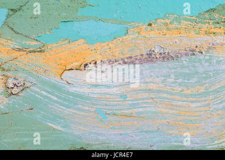 Yellow paint smears on a metal surface. Old metal texture for background Stock Photo