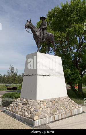 Mountie statue at Fort Calgary in Calgary, Canada. The monument commemorates the North West Mounted Police. Stock Photo
