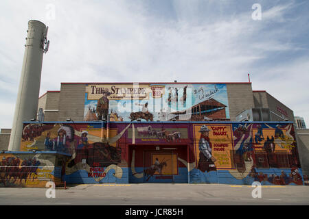 Street art on a building in Calgary Stampede grounds in Calgary, Canada. The artwork depcts Western themes. Stock Photo