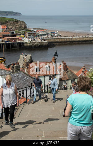 View of Whitby, North Yorkshire, UK, from the top of the famous 199 steps to Whitby Abbey & St Mary's Church Stock Photo