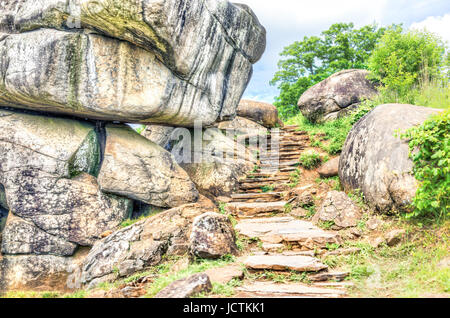 Trail leading to Devil's Den in Gettysburg battlefield national park with rock boulders during summer Stock Photo
