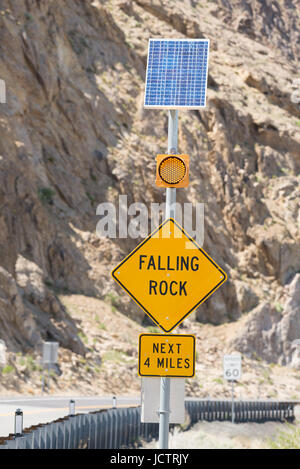 Solar powered falling rock warning sign on U.S. Highway 95 in Nevada. Stock Photo