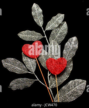Abstract Silver Fabric Leaves on Black background Stock Photo