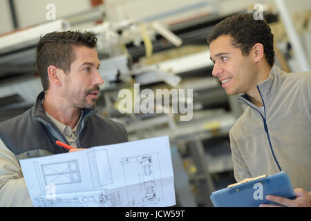 industrial engineer discussing a plan Stock Photo