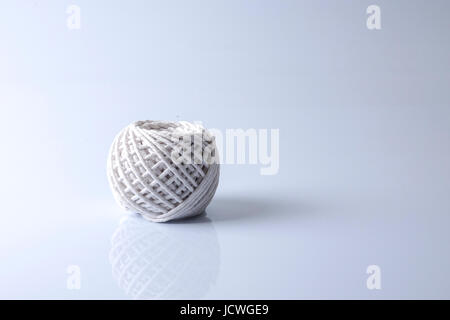 Thread spool isolated on white. Stock Photo