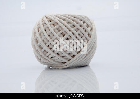 Thread spool isolated on white. Stock Photo