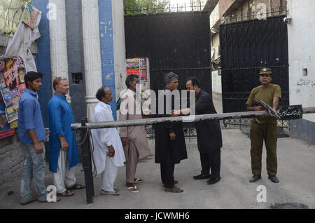 Lahore, Pakistan. 17th June, 2017. Pakistani security personnel busy in searching and clear the market near Imambargah karbala Gamay shah before procession, Youm-e-Ali. Youm-e-Ali (RA)the martyrdom day of Hazrat Ali (RA) processions is being observed today (Saturday) with religious harmony amid tight security across the country. Credit: Rana Sajid Hussain/Pacific Press/Alamy Live News Stock Photo