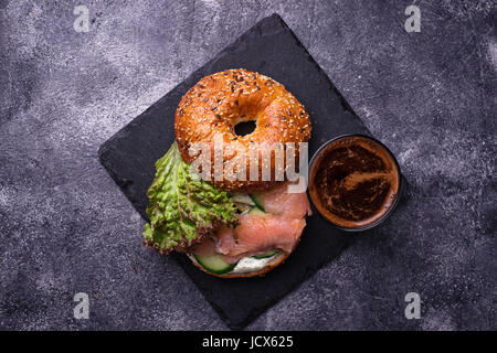 Bagels with salmon, cream cheese and lettuce. Selective focus Stock Photo