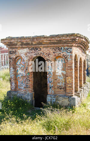 ancient abandoned house old brick and paintings Stock Photo