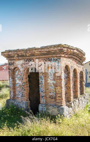 ancient abandoned house old brick and paintings Stock Photo
