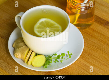 Cold Remedy: Cup of Lemon Ginger Tea Stock Photo