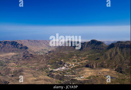 Gran Canaria, view from Pico de Las Nieves towards valley Barranco de Tirajana, dunes of Maspamonas in the far distance Stock Photo