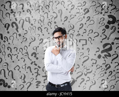 Thoughtful confused businessman Stock Photo