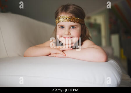 little girl lying and dreaming Stock Photo