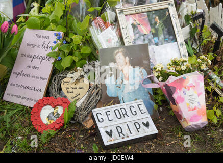 tributes from fans of the singer George Michael at an impromptu shrine outside the recently deceased musician’s house in Highgate, London in 2017 Stock Photo