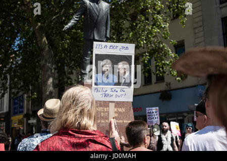 Cardiff, UK. 17th JUne, 2017. Campaigners gather under the Aneurin Bevan statue in Cardiff city centre to demand the resignation of Conservative Theresa May and protest against the deal with the Democratic Unionist Party from Northern Ireland. Taz Rahman/Alamy Live News Stock Photo