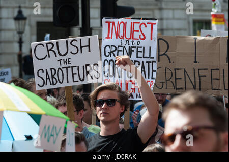 London, UK. 17th June, 2017. Pro-Labour demonstrators gather on Whitehall outside Downing Street in central London to protest against Prime Minister Theresa May, oppose an alliance between the Conservative Party and the Democratic Unionist Party (DUP) as well as demand justice for victims of Grenfell Tower fire. Credit: Wiktor Szymanowicz/Alamy Live News Stock Photo