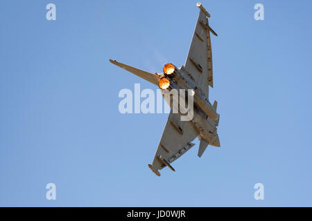 Weston-super-Mare, UK. 17th June, 2017. The RAF Typhoon Display Team lighting up the burners on their display routine in blue skies, on a summer day in Weston-super-Mare, UK. Credit: Bob Sharples/Alamy Live News Stock Photo