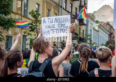 Kyiv, Ukraine. 18th June, 2017. LGBT activists take part in a march of Kyiv Pride 2017. The road was partly blocked by groups of nationalistic activists, but the distance of 1200 metres was passed by the Pride participants without accidents. More than 2000 people took part in the Pride. Credit: Kateryna Olexenko/Alamy Live News Stock Photo