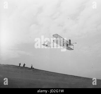 Right front view of Wright Brothers glider in flight. Stock Photo