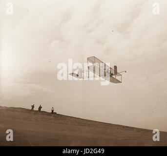 Right front view of Wright Brothers glider in flight. Stock Photo