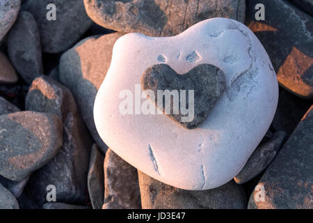 Heart-shaped Rock on Beach in Gros Morne National Park, near Rocky Harbour, Newfoundland, Canada Stock Photo