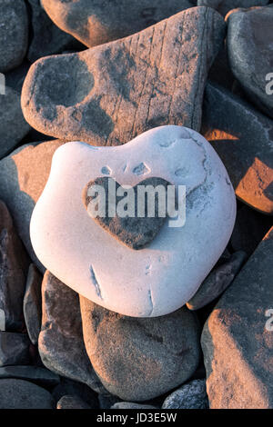 Heart-shaped Rock on Beach in Gros Morne National Park, near Rocky Harbour, Newfoundland, Canada Stock Photo