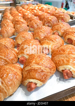 Closed up Sausage croissant in the food shop Stock Photo