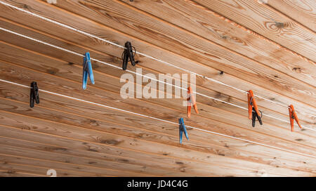 Plastic colored clothes pegs Stock Photo