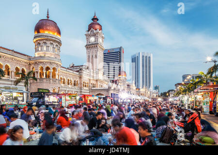 The mass breaking of fast during the month of syawal in Merdeka Square, Kuala Lumpur. Stock Photo