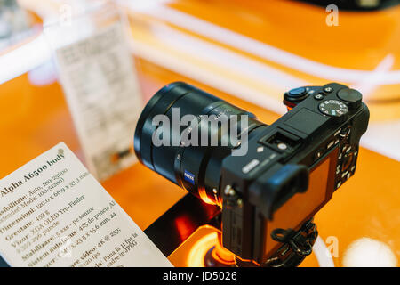 BUCHAREST, ROMANIA - JUNE 18, 2017: Sony a6500 is a mirrorless interchangeable lens camera and first Sony model to integrate a 5-axis image stabilizat Stock Photo