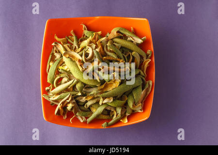 Dried Mango slices for Pickle in a bowl Stock Photo