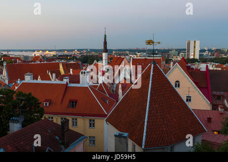 Red roofs of Old Town against blue sky after sunset sky, Tallinn, Estonia Stock Photo