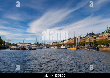 STOCKHOLM - SEPTEMBER, 15, 2016: Boats along street of Stockholm Stock Photo