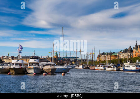 STOCKHOLM - SEPTEMBER, 15, 2016: Boats along street of Stockholm Stock Photo